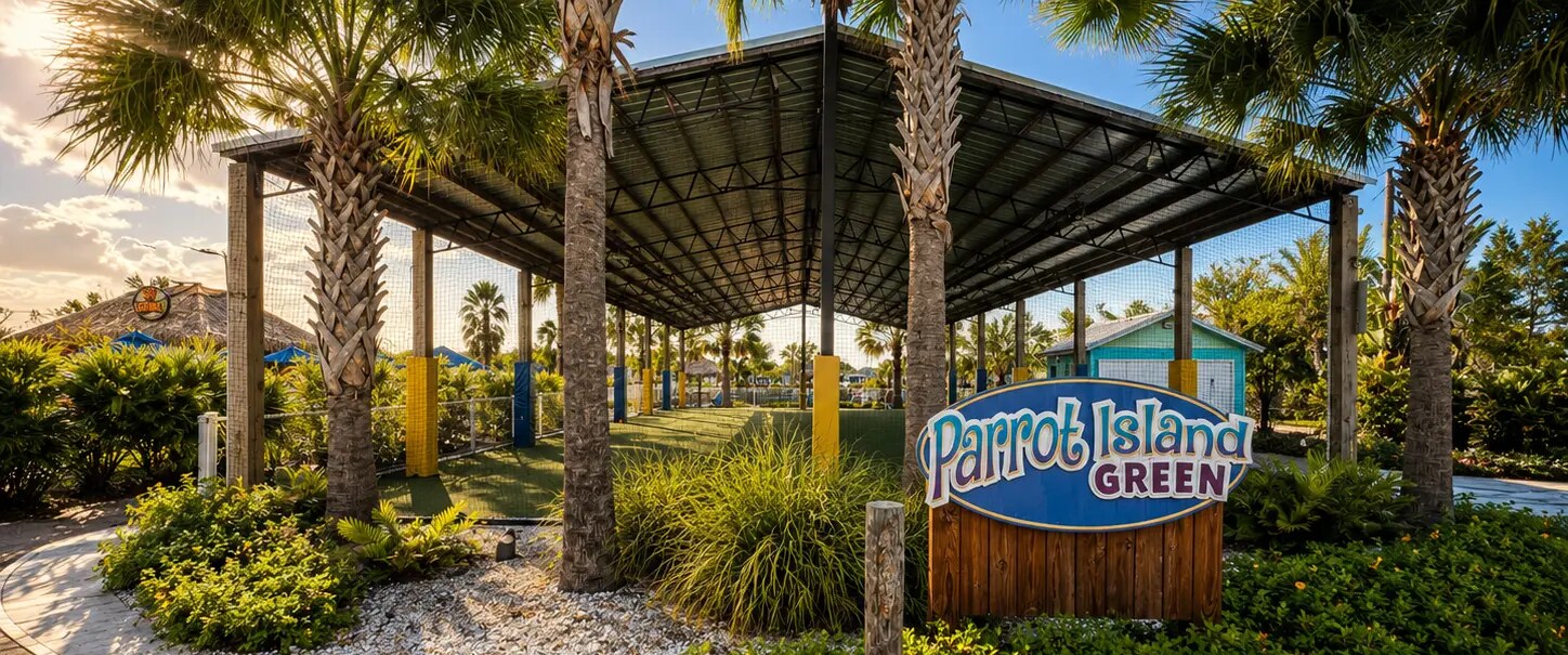 Covered multi-use sport court and Parrot Island Green entry signage at Camp Margaritaville
