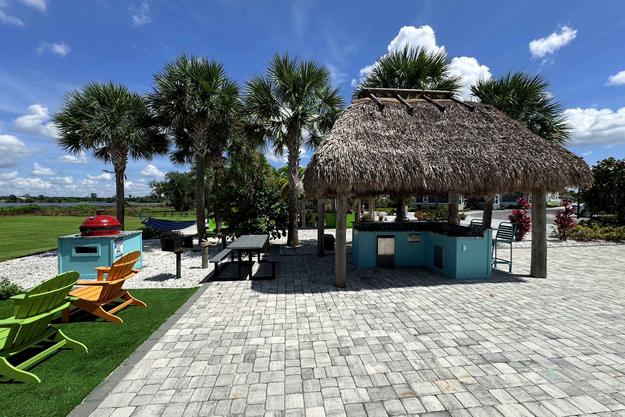 Covered tiki bar and lounge seating area at Camp Margaritaville
